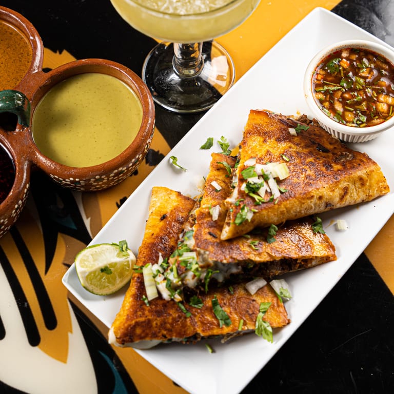 Delicious Birria Tacos Await